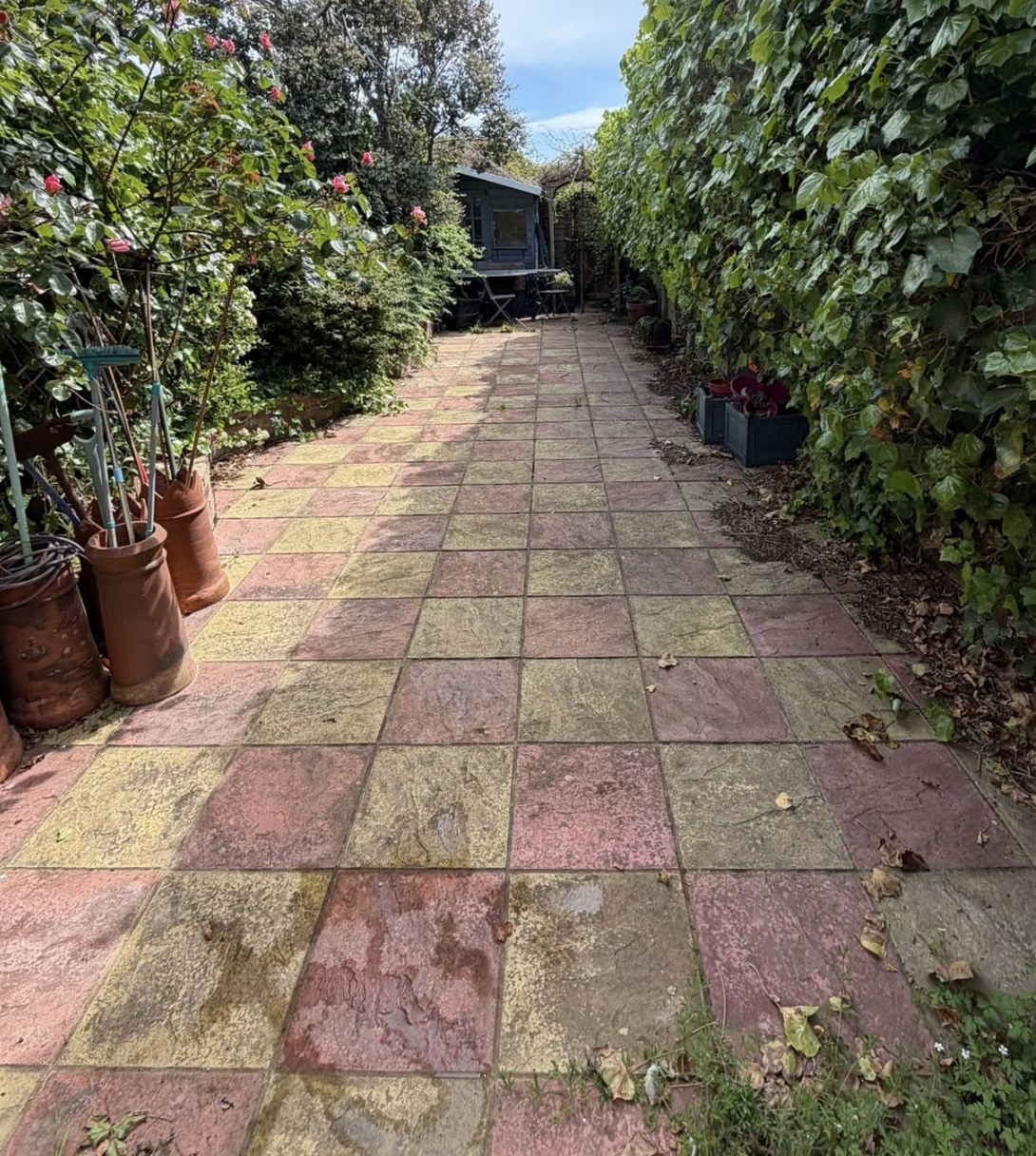 Red and yellow path faded and dirty before cleaning